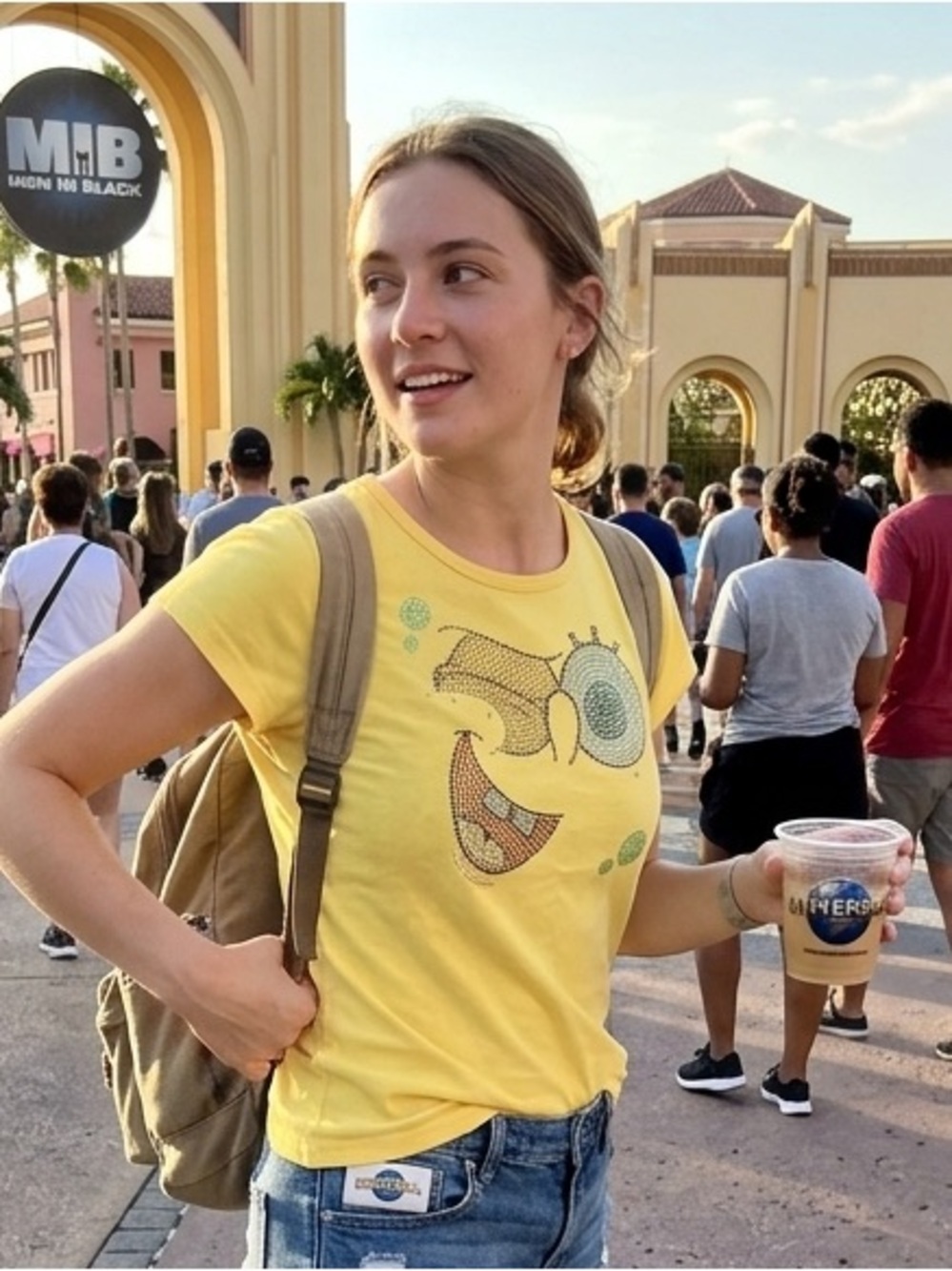 Universal Yellow Short-Sleeve Graphic Tee with Rhinestone Smiley - size large